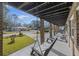 Relaxing front porch with a porch swing and seating at 1520 Acacia St, Charleston, SC 29407