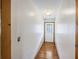 Bright hallway with wood floors and access to the home's interior at 1520 Acacia St, Charleston, SC 29407