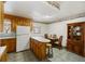 Bright kitchen with wood cabinets and a built-in hutch at 1520 Acacia St, Charleston, SC 29407