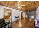 Spacious living room with hardwood floors and a wood-paneled ceiling at 1520 Acacia St, Charleston, SC 29407