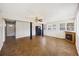 Spacious living room with tile floors, ceiling fan, and fireplace at 1520 Acacia St, Charleston, SC 29407