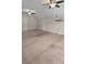 Large bonus room with vaulted ceiling, neutral carpet, and ceiling fans at 1813 Towne St, Johns Island, SC 29455