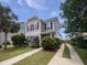 Charming two-story home featuring a well-manicured front yard, driveway, and welcoming curb appeal at 1813 Towne St, Johns Island, SC 29455