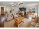 Open living space with hardwood floors, kitchen, and island at 1813 Towne St, Johns Island, SC 29455