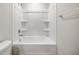 Bathroom with a shower/tub combo and built-in shelving at 189 W Bradford Pointe Dr, Summerville, SC 29486