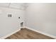 Bright laundry room with vinyl flooring and storage at 189 W Bradford Pointe Dr, Summerville, SC 29486