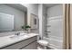 Bathroom with gray vanity, bathtub, and shower at 225 W West Bradford Pointe Dr, Summerville, SC 29483