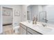 Double vanity bathroom with a walk-in shower and large mirror at 225 W West Bradford Pointe Dr, Summerville, SC 29483