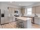 Modern kitchen with stainless steel appliances and a large island at 225 W West Bradford Pointe Dr, Summerville, SC 29483