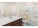 Bathroom with tub, shower, and colorful curtain at 241 Swamp Creek Ln, Moncks Corner, SC 29461