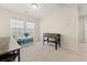 Versatile bonus room with foosball table and workspace at 241 Swamp Creek Ln, Moncks Corner, SC 29461