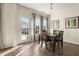 Dining area with wood table and chairs, and access to backyard at 241 Swamp Creek Ln, Moncks Corner, SC 29461
