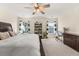 Spacious main bedroom with a king-size bed and built-in shelves at 241 Swamp Creek Ln, Moncks Corner, SC 29461