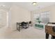Bright play room with desk, foosball table, and ample natural light at 241 Swamp Creek Ln, Moncks Corner, SC 29461
