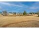 Community pond view with homes and landscaping at 310 Bloomington Way, Summerville, SC 29486