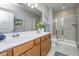 Bathroom with a double vanity, walk-in shower, and modern fixtures at 310 Bloomington Way, Summerville, SC 29486