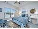 Bedroom with a comfy bed, coastal-themed art, and plenty of natural light at 310 Bloomington Way, Summerville, SC 29486