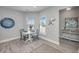 Charming breakfast nook with white table and blue chairs at 310 Bloomington Way, Summerville, SC 29486