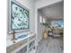 Bright entryway with coastal-themed decor and view into living room at 310 Bloomington Way, Summerville, SC 29486