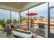 Relaxing screened porch with comfortable seating and outdoor table at 310 Bloomington Way, Summerville, SC 29486