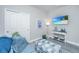 Sitting room with TV, comfortable seating, and coastal decor at 310 Bloomington Way, Summerville, SC 29486