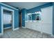 Bathroom with double vanity, walk-in shower, and tiled floors at 490 Cummings Chapel Rd, Ridgeville, SC 29472