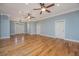 Large living area with hardwood floors and high ceilings at 490 Cummings Chapel Rd, Ridgeville, SC 29472