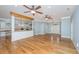 Open living space with hardwood floors and kitchen views at 490 Cummings Chapel Rd, Ridgeville, SC 29472