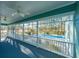 Large screened porch overlooking a sparkling pool and private backyard at 490 Cummings Chapel Rd, Ridgeville, SC 29472