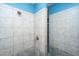 Large tiled shower with a modern shower head at 490 Cummings Chapel Rd, Ridgeville, SC 29472