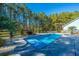Enjoy this refreshing pool with stamped concrete decking at 490 Cummings Chapel Rd, Ridgeville, SC 29472