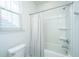 Bathroom with tub, shower, and window at 507 N Commodore Way, Summerville, SC 29483