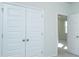 Bedroom with double door closet and access to another room at 507 N Commodore Way, Summerville, SC 29483