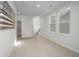 Spacious bonus room with neutral carpeting and natural light at 507 N Commodore Way, Summerville, SC 29483