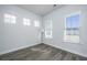 Bright home office with hardwood floors and multiple windows at 507 N Commodore Way, Summerville, SC 29483