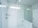 Large walk-in shower with white tile and glass enclosure at 507 N Commodore Way, Summerville, SC 29483
