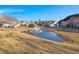 Community with pond, fountain, and multiple townhouses at 5222 Chicory Ln, North Charleston, SC 29420