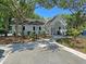 Community clubhouse with covered entrance and landscaping at 5222 Chicory Ln, North Charleston, SC 29420