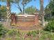 Brick sign marking the entrance to Coosaw Commons at 5222 Chicory Ln, North Charleston, SC 29420