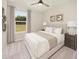 Comfortable guest bedroom with large window and neutral decor at 723 Blue Iris Way, Summerville, SC 29486