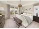 Spacious primary bedroom with plush bedding and ample natural light at 723 Blue Iris Way, Summerville, SC 29486