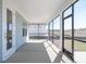 Screened in porch with large windows and plenty of sunlight at 723 Blue Iris Way, Summerville, SC 29486