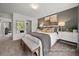 Charming bedroom with a queen bed and stylish decor at 1015 Marsh Harrier Dr # Cc3-3-2, Ravenel, SC 29470