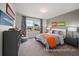 Bright bedroom with a double bed, storage, and playful decor at 1015 Marsh Harrier Dr # Cc3-3-2, Ravenel, SC 29470