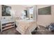 Sweet bedroom with a twin bed and calming decor at 1015 Marsh Harrier Dr # Cc3-3-2, Ravenel, SC 29470