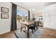Bright dining room with wooden table, chairs, and built-in cabinetry at 1015 Marsh Harrier Dr # Cc3-3-2, Ravenel, SC 29470