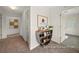 Spacious hallway with built-in shelving and access to bedrooms at 1015 Marsh Harrier Dr # Cc3-3-2, Ravenel, SC 29470