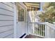 White door with awning and white railing at 1040 Barfield St, Charleston, SC 29492