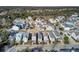 Aerial view of a charming neighborhood with colorful houses and lush greenery at 1040 Hills Plantation Dr, Charleston, SC 29412