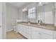Double vanity bathroom with granite countertop and tile floor at 1040 Hills Plantation Dr, Charleston, SC 29412